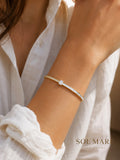 Solmare Aurora Solitaire Bangle | 316L Stainless Steel | 18K PVD Gold-Plated | 3-Year Warranty